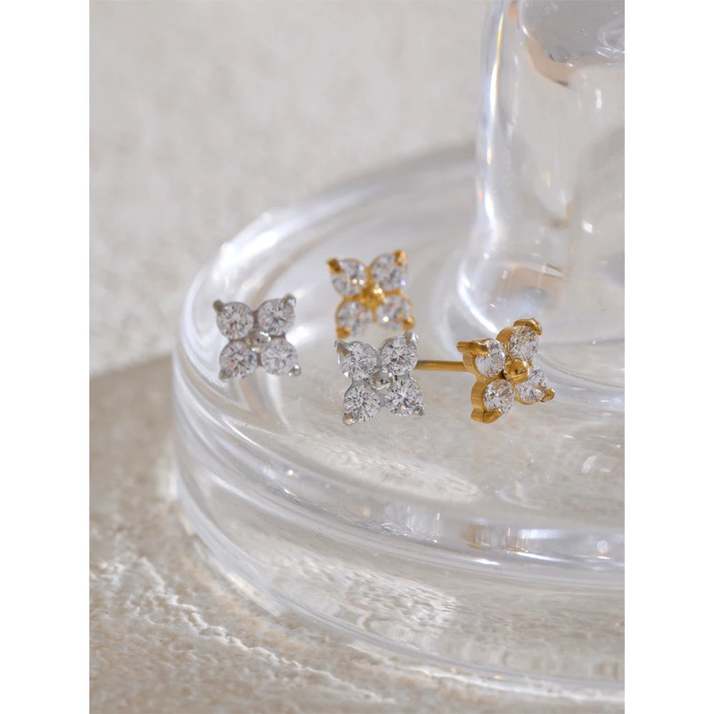 Dainty flower earrings in silver and gold with sparkling crystals