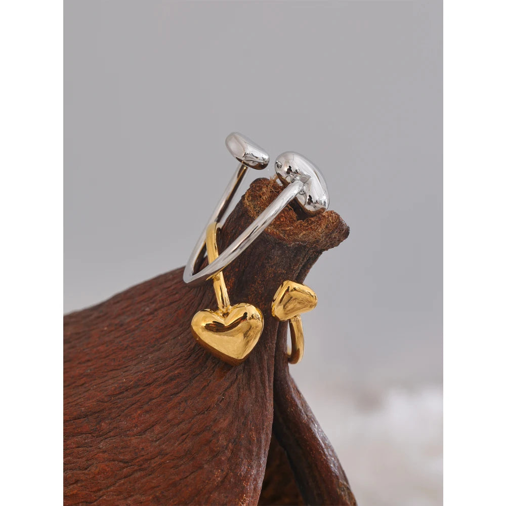Mixed metal open rings