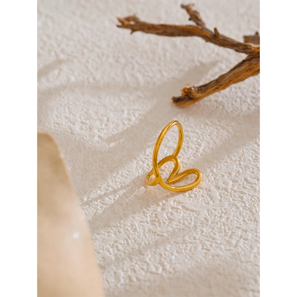 Sculptural gold wave ring