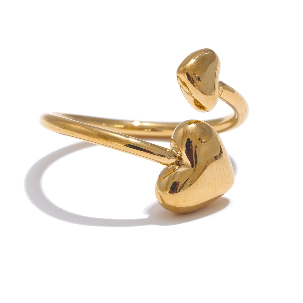 Unique gold ring featuring two hearts